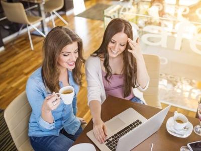 Two Women learning At a computer